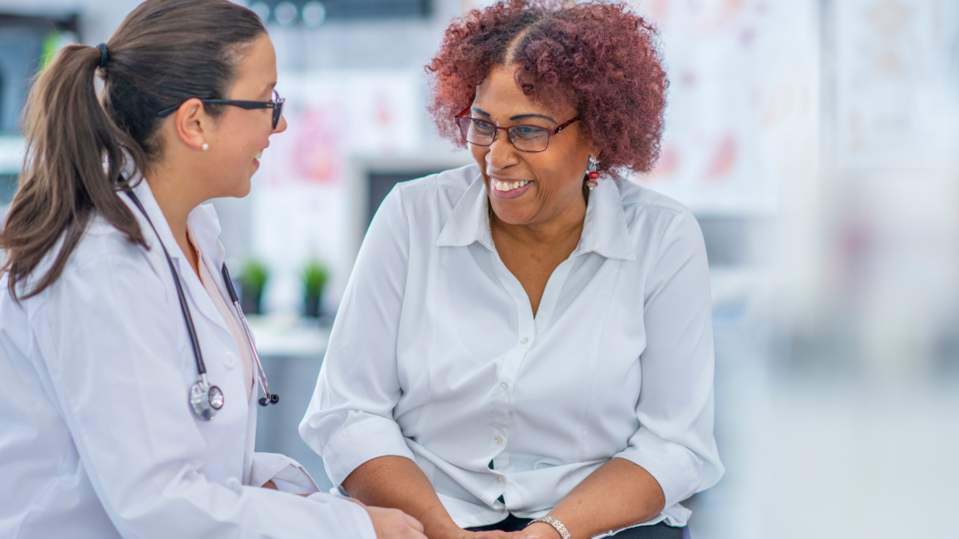 A doctor talks to a patient