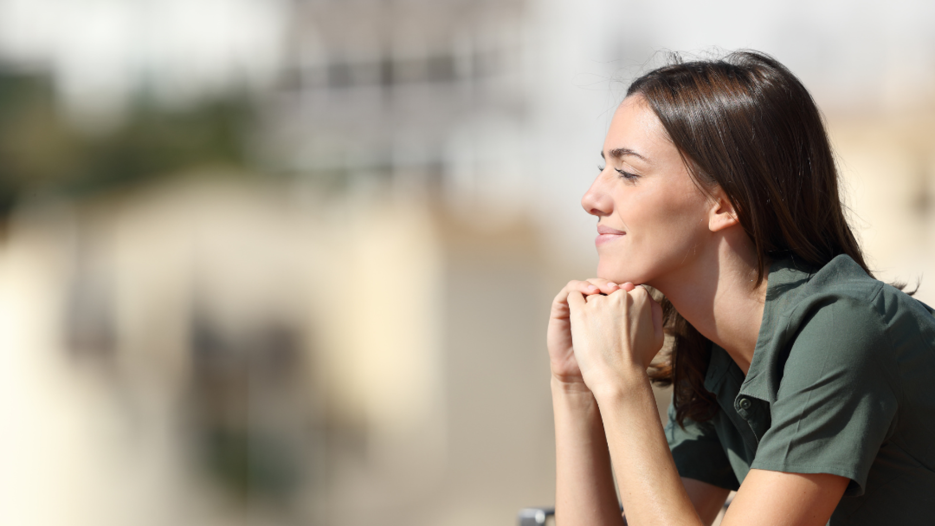 A woman looks out to the distance